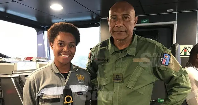 Bridge watch keeper Ensign Mereseini Sokoilagi with Republic of Fiji Military Forces Commander Rear Admiral Viliame Naupoto on the bridge of the RFNS Savenaca. Photo: Laisa Lui