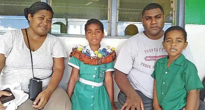 From left: Asena Naivalu, daughter Hadassah Weleilakeba, her husband Neomi Naivalu, and son Paula Maisiri in Seaqaqa on February 27, 2024. Photo: Jone Salusalu