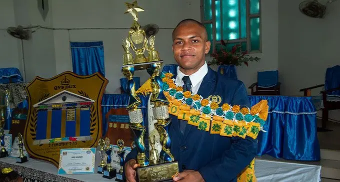 Queen Victoria School 2024 dux Tevita Tucaketale Koroi with his award on November 29, 2024. Photo: Leon Lord