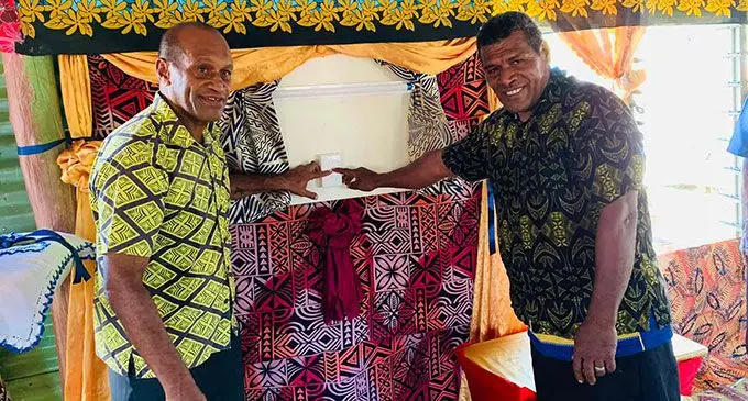 Minister for Infrastructure, Meteorological Services, Lands and Mineral Resources Jone Usamate (left) commissioning the Electrification Project at Nabiti Village, Dreketi. Photo: Sampras Anand
